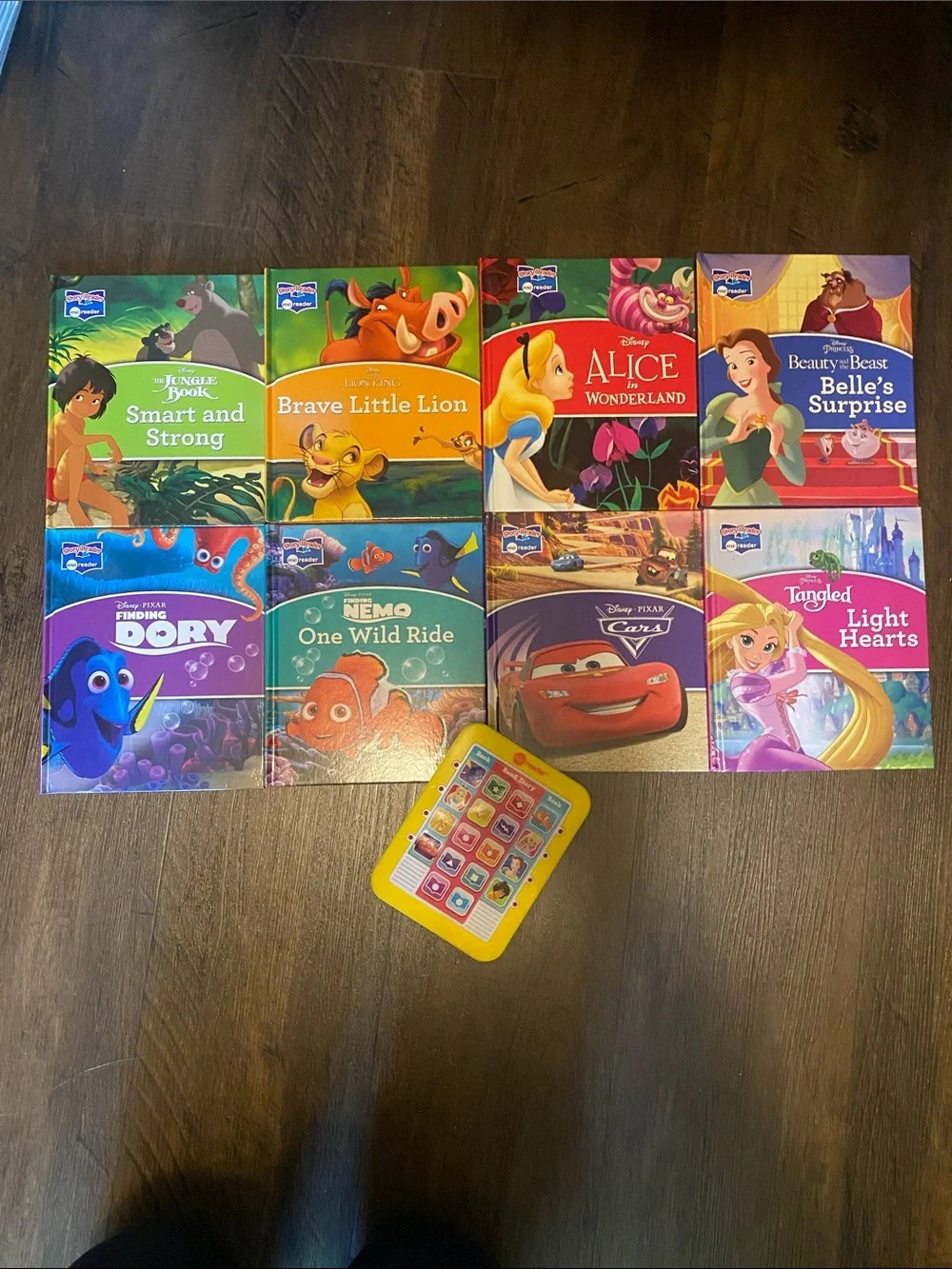 Disney Electronic MeReader with 8 books: Nemo, Cars, Rapunzel, Belle, Lion King
